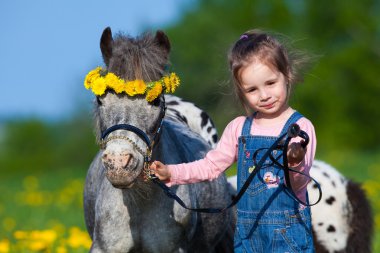 Child and horse clipart