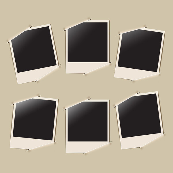 Retro photo frames on album background