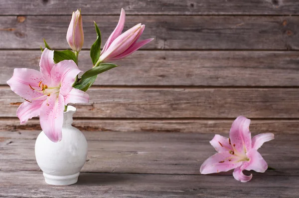 Flowers on wooden background — Stock Photo, Image