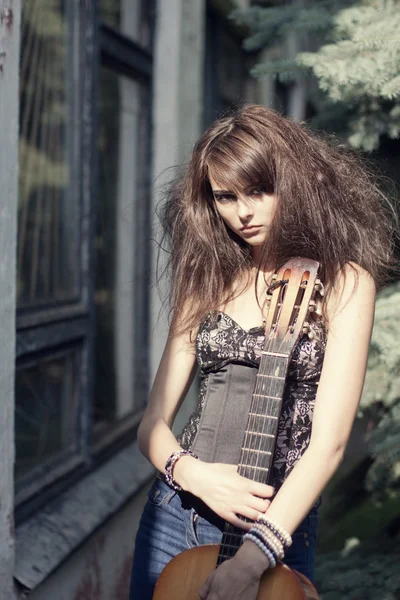 Model with vintage guitar. — Stock Photo, Image