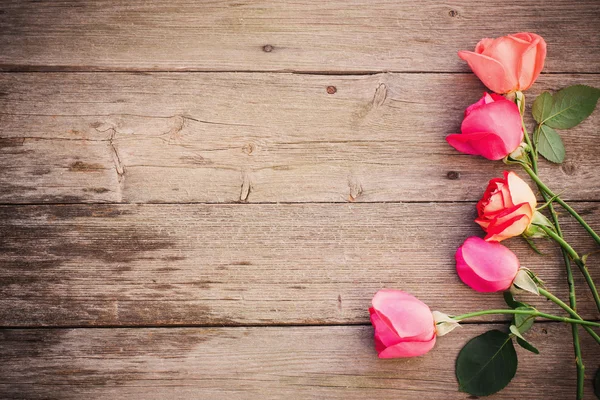 Rose on wooden background — Stock Photo, Image