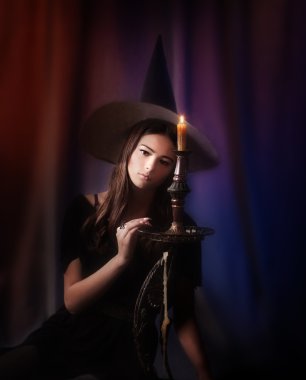 Young beautiful witch clipart
