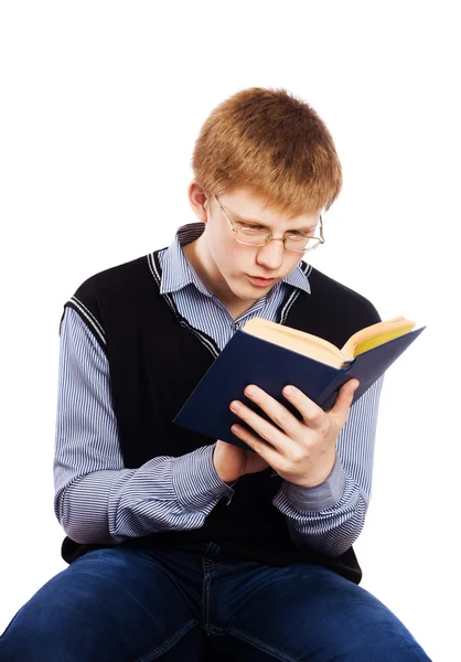 Teenager mit Buch isoliert auf weiß — Stockfoto