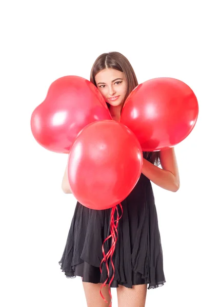 Bella ragazza con palloncino rosso nel cuore forma — Foto Stock