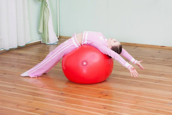 Girl exercising indoor — Stock Photo, Image