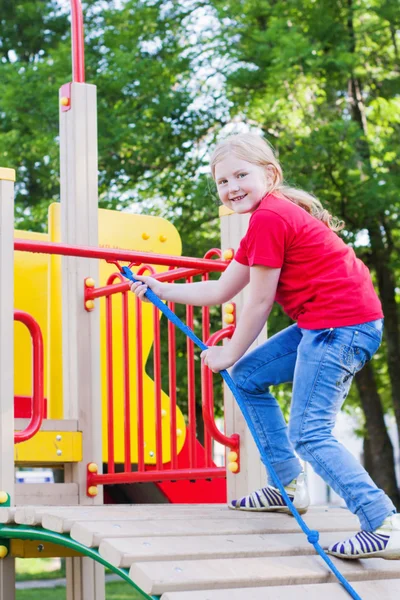 Menina no parque infantil — Fotografia de Stock