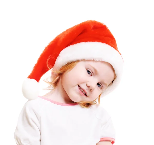 Niña en sombrero de santa rojo sobre fondo blanco — Foto de Stock