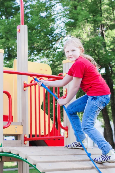 Menina no parque infantil — Fotografia de Stock