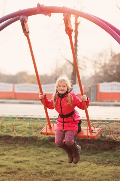 Happy girl on swing — Stock Photo, Image