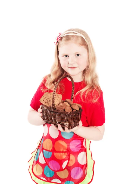 Hermosa niña sosteniendo galletas aisladas en blanco —  Fotos de Stock