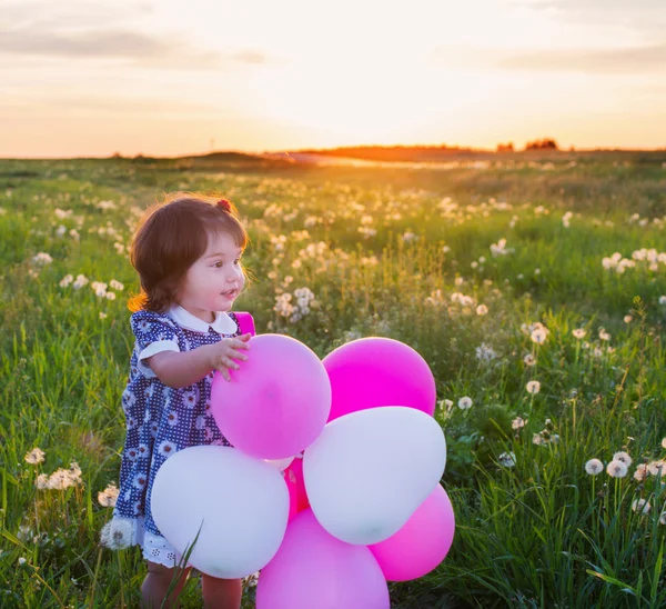 Bambina con palloncini — Foto Stock