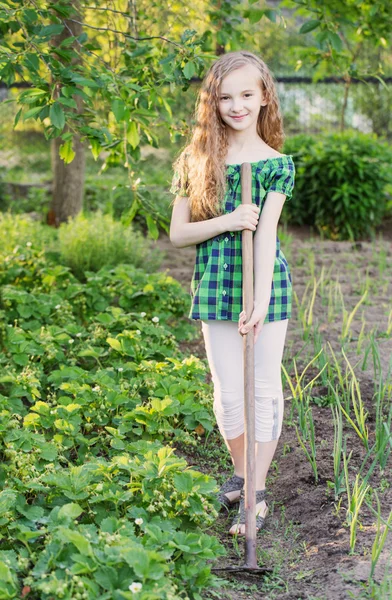 Girl work in a garden — Stock Photo, Image