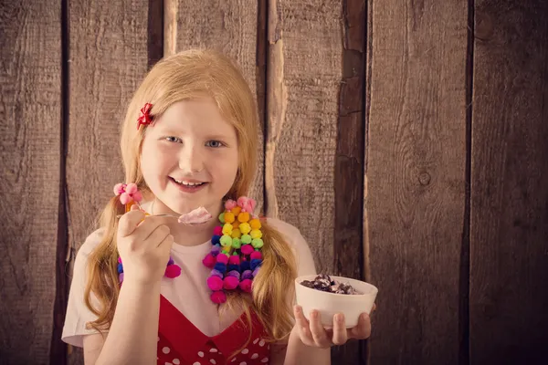 Girl with berry dessert — Stock Photo, Image