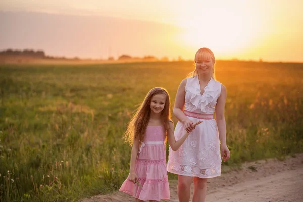 Woman with girl — Stock Photo, Image