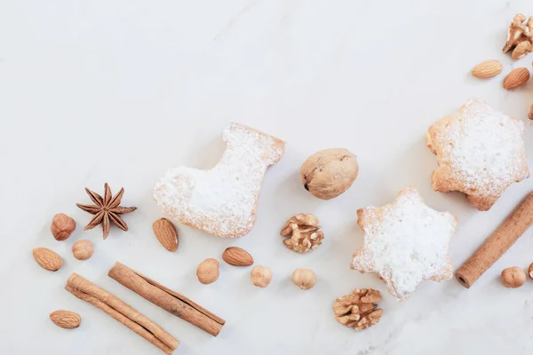 christmas cookies on white marble table