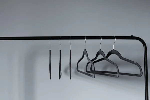 Empty Black Clothes Hanger Gray Wall Background — Stock Photo, Image