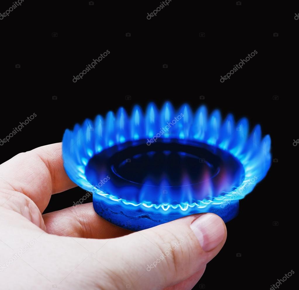 Hands holding a flame gas Stock Photo by ©doroshin 44963407