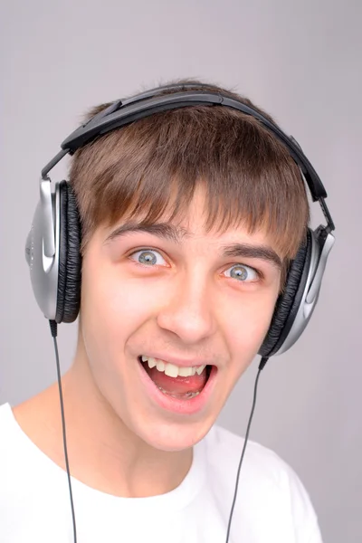 Teenager in headphones — Stock Photo, Image
