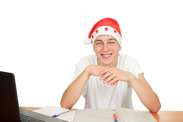 Happy student in santa hat Stock Photo
