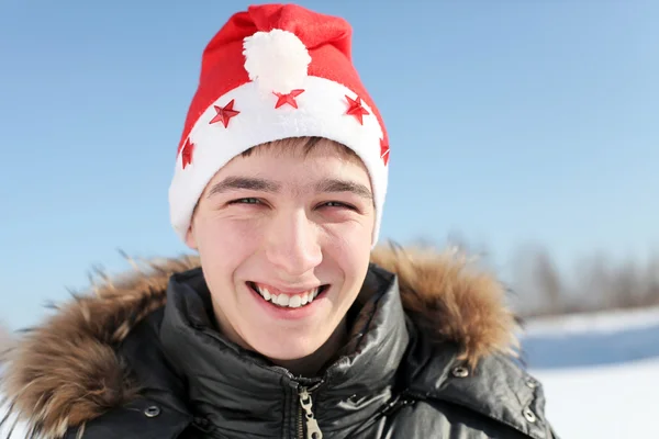 Giovane a Babbo Natale cappello — Foto Stock