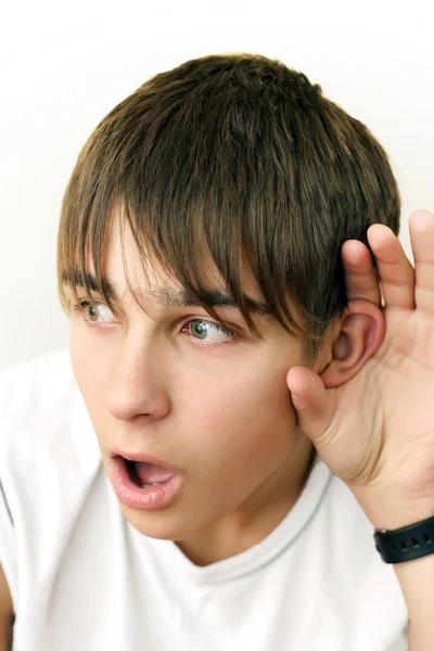 10 代の何かに耳を傾ける — ストック写真
