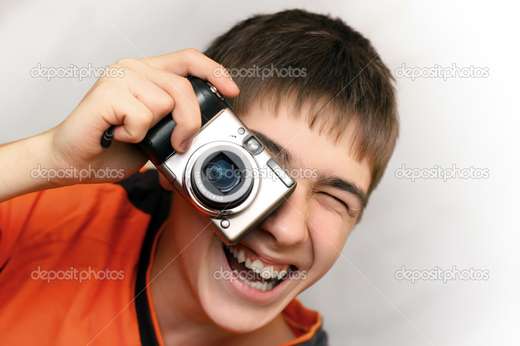 Teenager With Photocamera