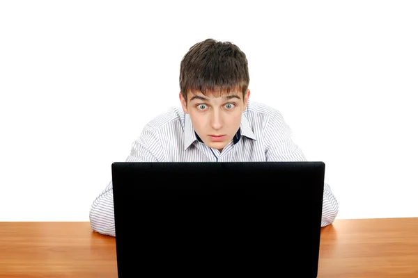 Jonge man met laptop Stockfoto