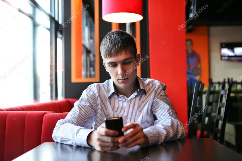 Sad Young Man In Restaurant
