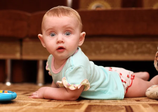 Surprised Baby on the Floor — Stock Photo, Image