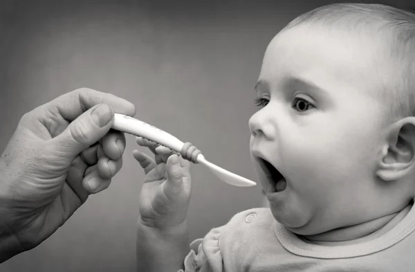 Baby Eats Royalty Free Stock Images