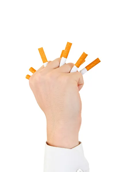 Mano con cigarrillos rotos — Foto de Stock