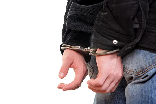 Handcuffs on Hands closeup — Stock Photo, Image