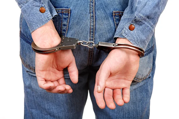 Handcuffs on Hands closeup — Stock Photo, Image