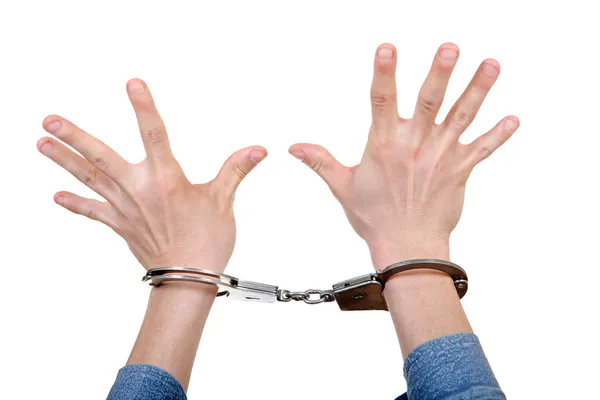 Handcuffs on Hands closeup — Stock Photo, Image