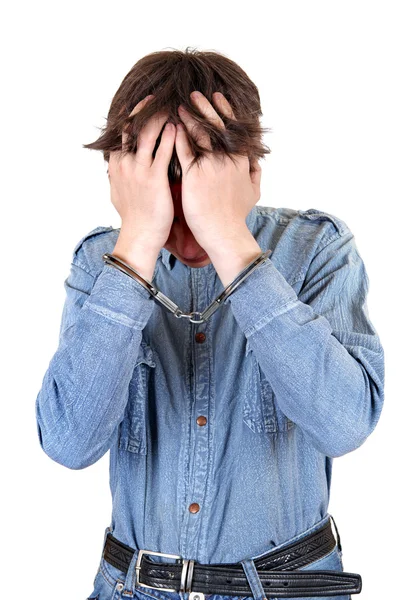 Hombre esposado Esconde su cara — Foto de Stock