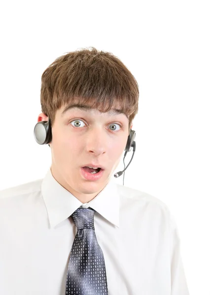Překvapen, mladý muž s headsetem — Stock fotografie