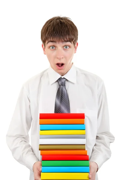 Studentin hält Bücherstapel in der Hand — Stockfoto