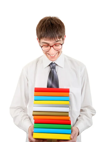 Gelukkig student houden stapel van de boeken — Stockfoto