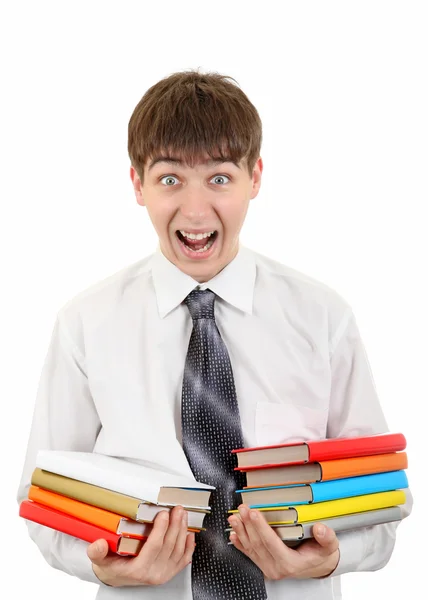 Estudiante sorprendido con muchos libros — Foto de Stock