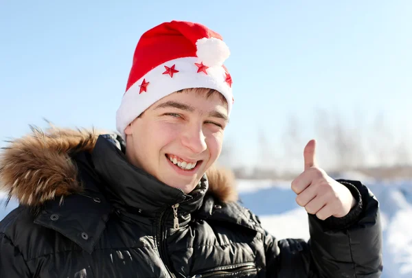 Giovane a Babbo Natale cappello — Foto Stock