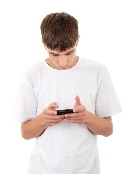 Νεαρός άνδρας με κινητή συσκευή — Φωτογραφία Αρχείου