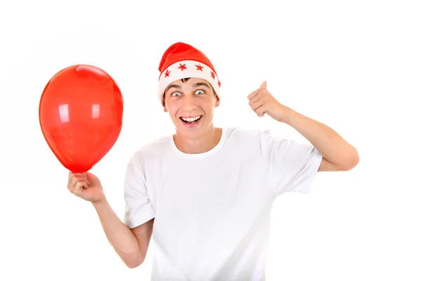 Glad teenager med rød ballon - Stock-foto