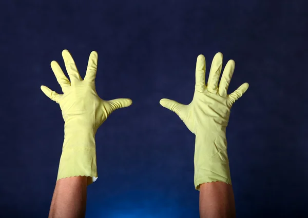 Guantes de goma con las manos —  Fotos de Stock