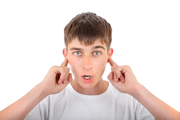Teenager se zacpanýma ušima — Stock fotografie