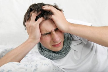Sick Young Man feel Headache clipart
