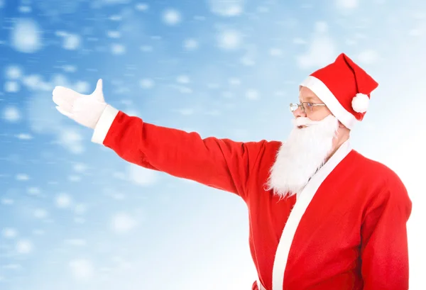 Santa claus odcinka rękę — Stockfoto