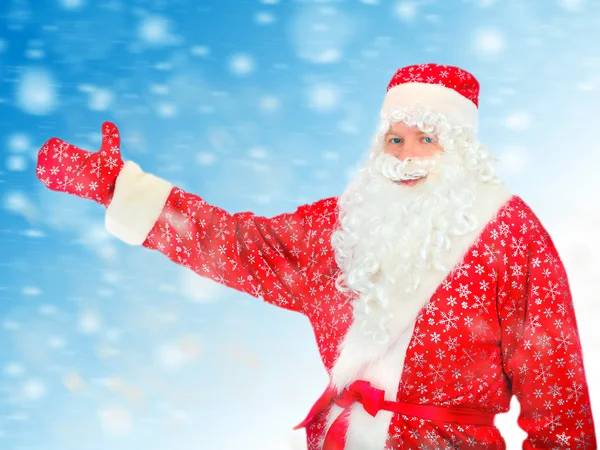 Santa claus odcinka rękę — Stockfoto