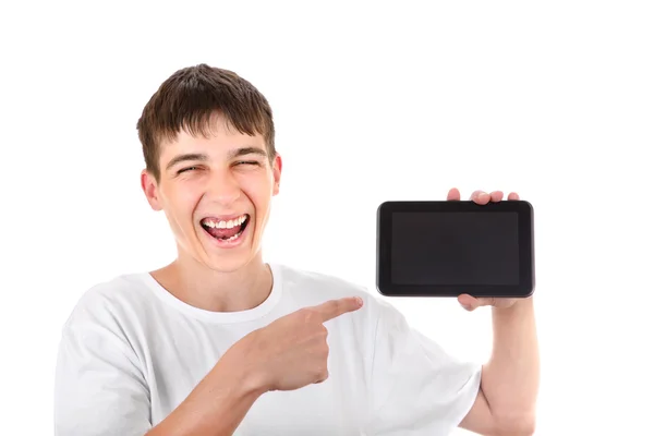 Teenager mit Tablet-Computer Stockbild