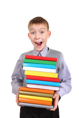 yığın kitap tutan çocuk