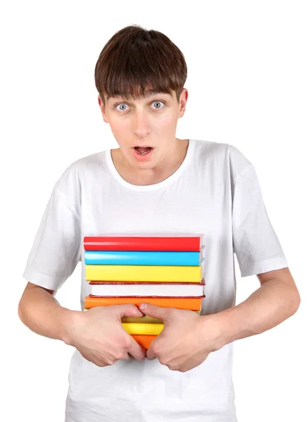 Удивленный студент с книгами — стоковое фото